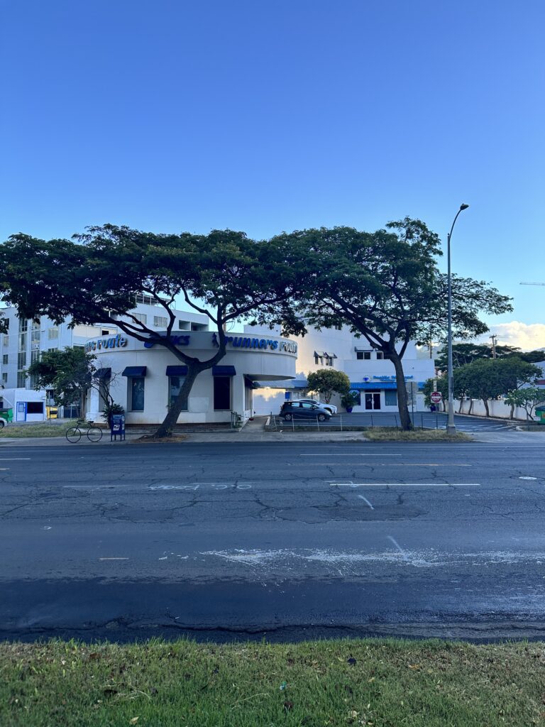 Hawai'i Travel News November 2023 | New Hotels & Flight Updates Hawaii Calling a street with trees in front of a building