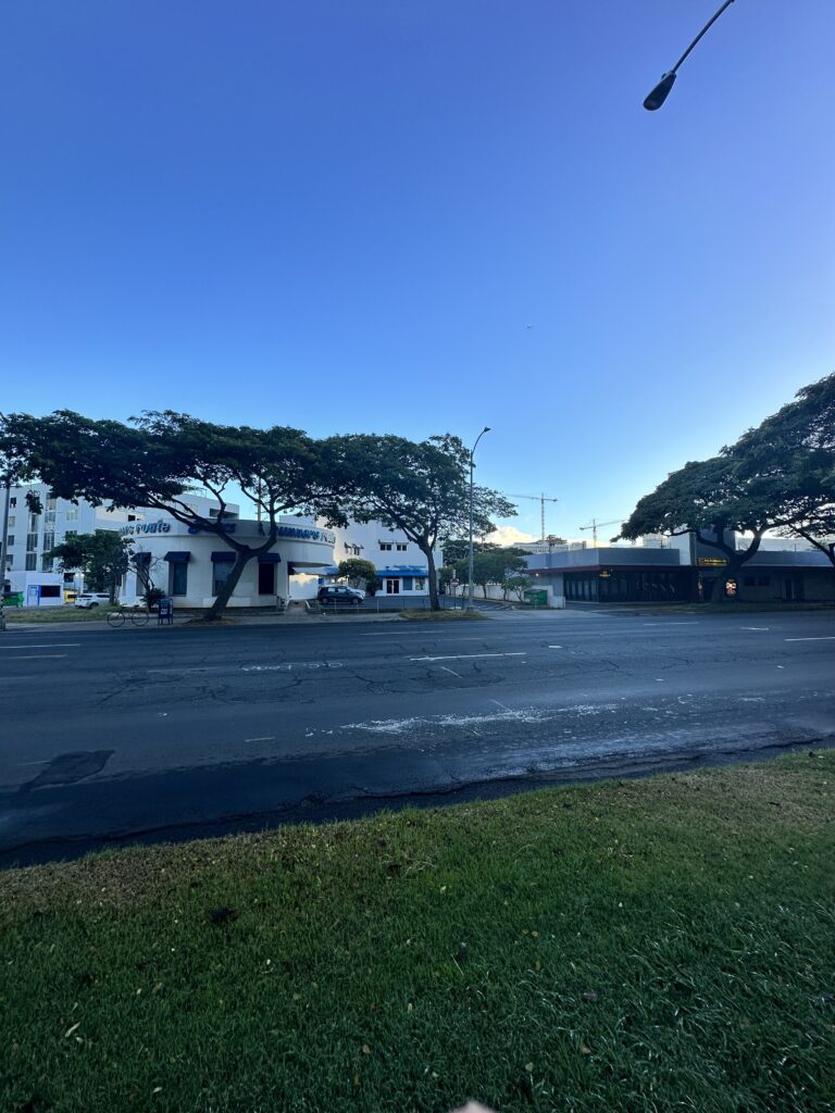 Hawai'i Travel News November 2023 | New Hotels & Flight Updates Hawaii Calling a street with trees and buildings