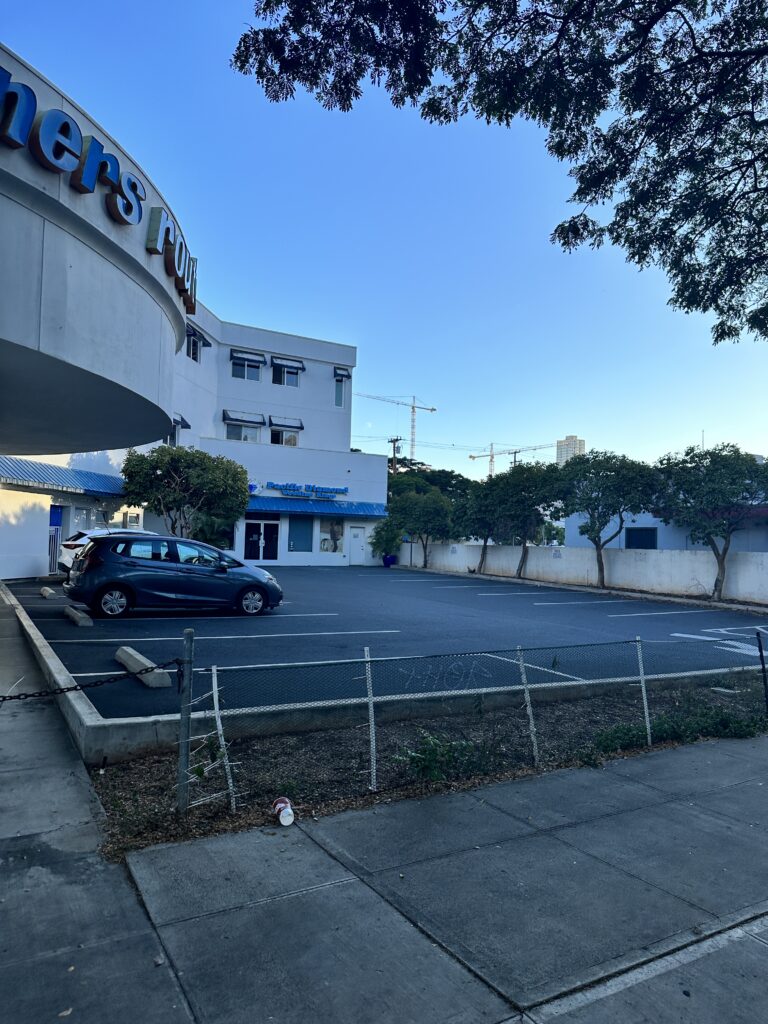Hawai'i Travel News November 2023 | New Hotels & Flight Updates Hawaii Calling a parking lot with a building and trees