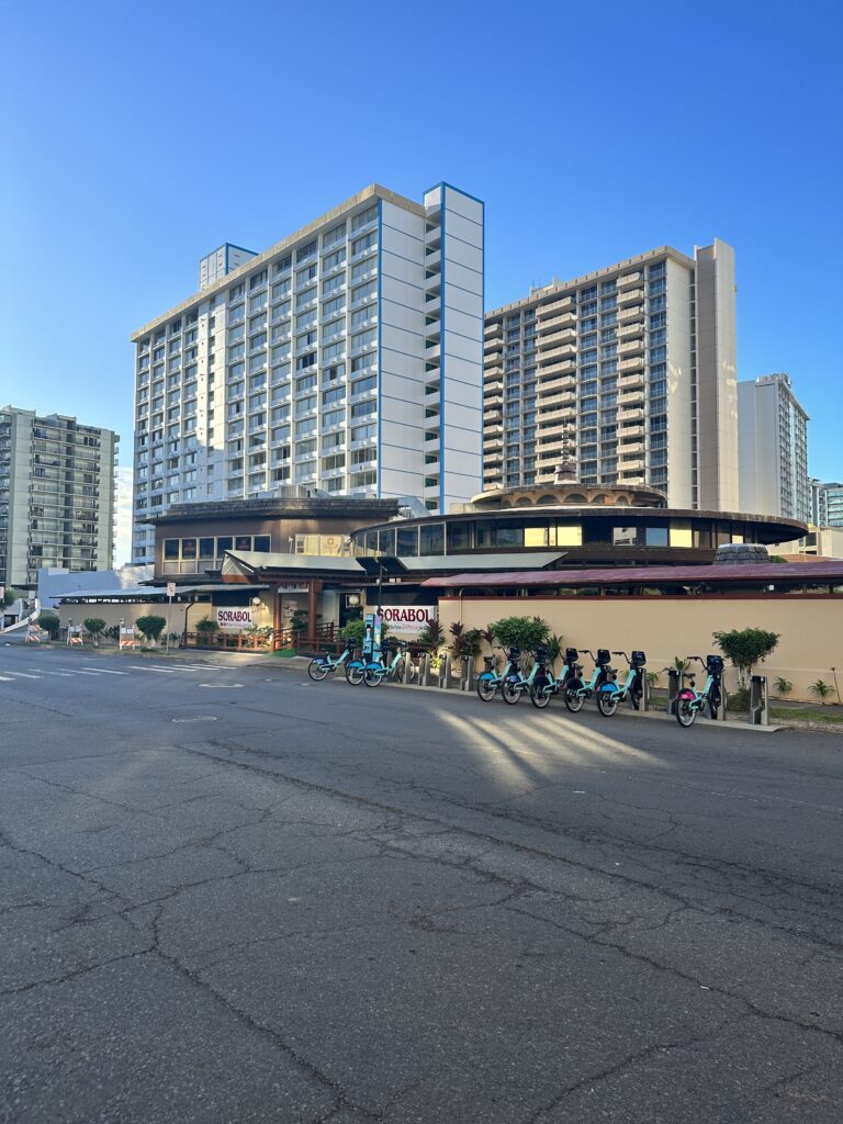 Hawai'i Travel News November 2023 | New Hotels & Flight Updates Hawaii Calling a street with bicycles parked on the side