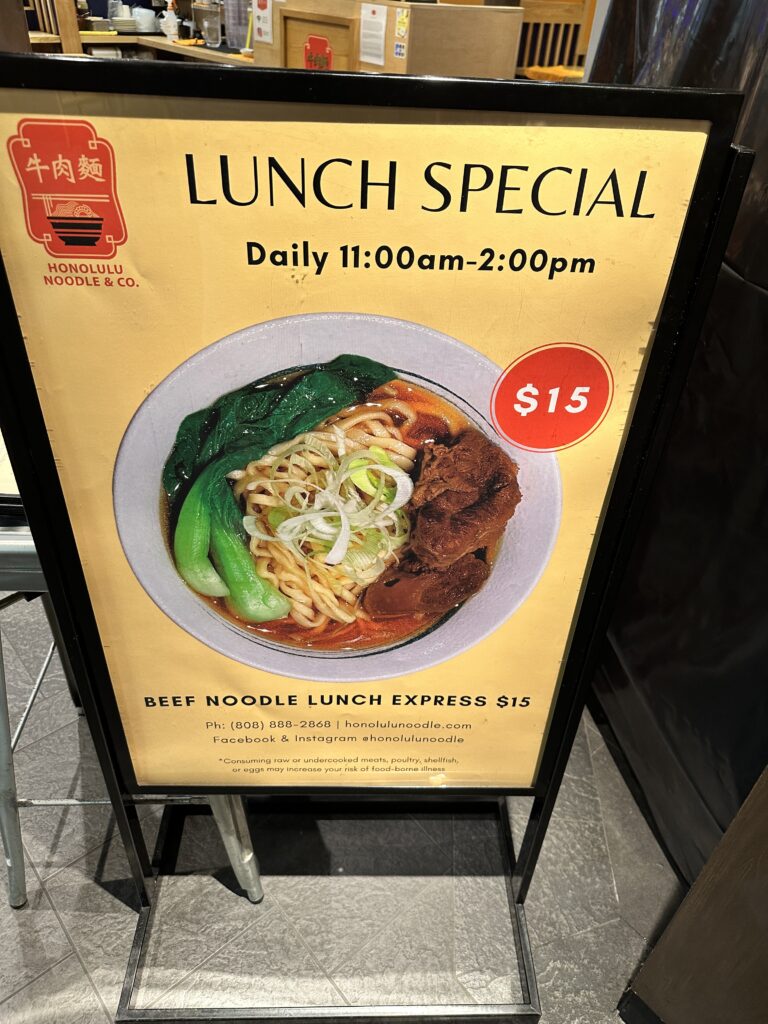 STIX Waikiki: A Foodie's Paradise in the Heart of Waikiki Beach Hawaii Calling a sign with a picture of food on it