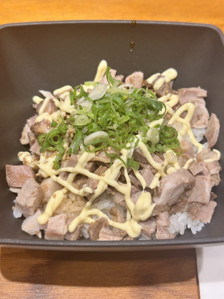 STIX Waikiki: A Foodie's Paradise in the Heart of Waikiki Beach Hawaii Calling a bowl of food with meat and onions