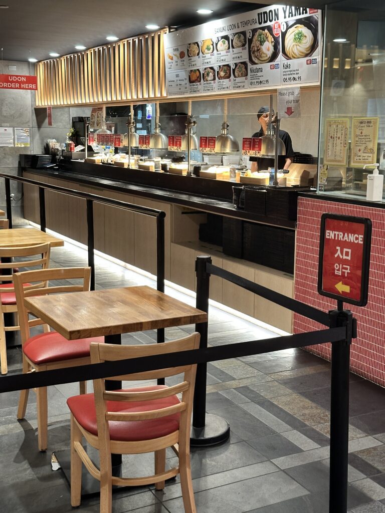 STIX Waikiki: A Foodie's Paradise in the Heart of Waikiki Beach Hawaii Calling a restaurant with tables and chairs