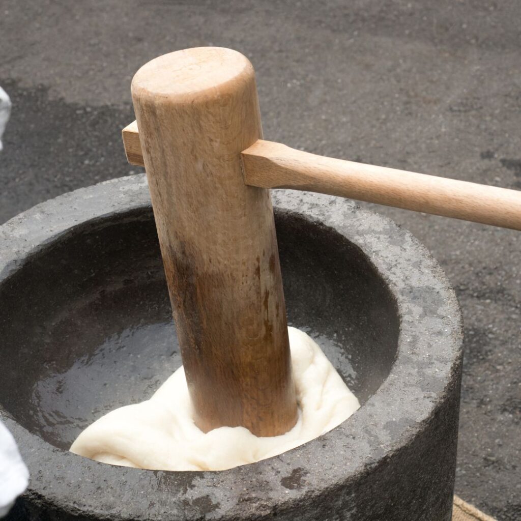 Best Way To Celebrate New Year's Eve In Hawaii (2024-25) Hawaii Calling a wooden stick in a mortar