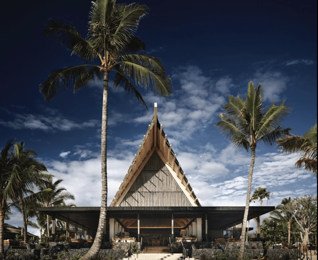 13 Best Luxury Hotels in Hawaii (2025) Hawaii Calling a building with palm trees and a triangular roof