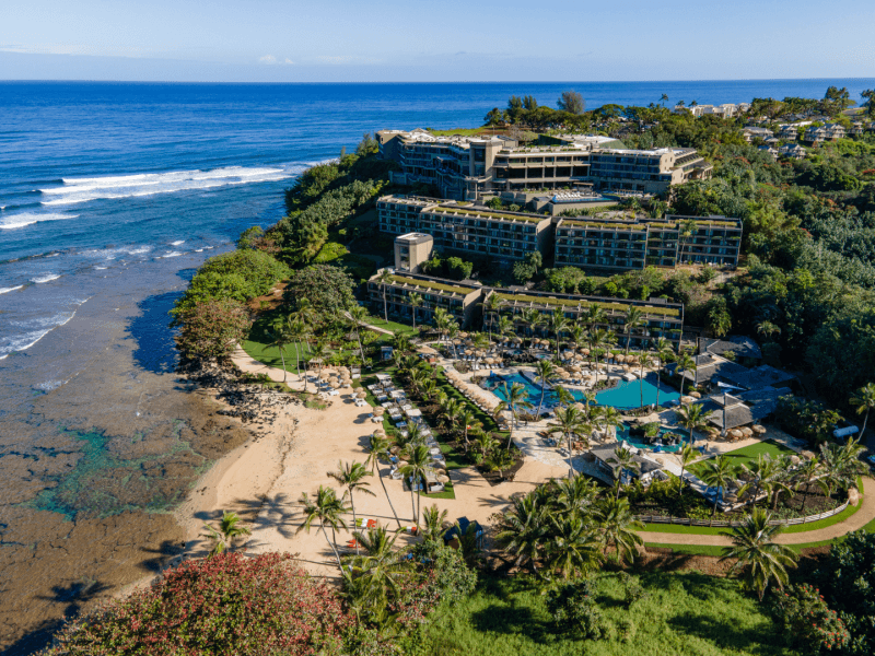 13 Best Luxury Hotels in Hawaii (2025) Hawaii Calling a resort with a pool and a beach