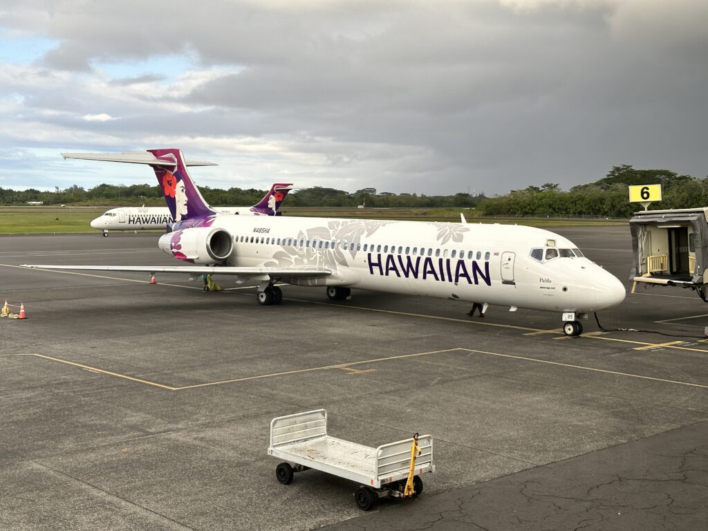 Review: Hawaiian Airlines Hilo To Honolulu | Boeing 717 | ITO-HNL Hawaii Calling a white airplane on the tarmac hawaiian airlines hilo to honolulu