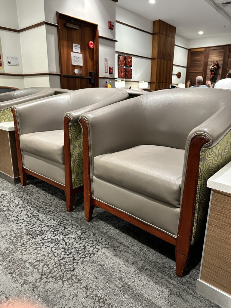 Delta Sky Club Honolulu | Guide & Review (2025) Hawaii Calling a group of chairs in a room