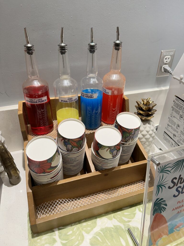Delta Sky Club Honolulu | Guide & Review (2025) Hawaii Calling a wooden box with bottles and cups