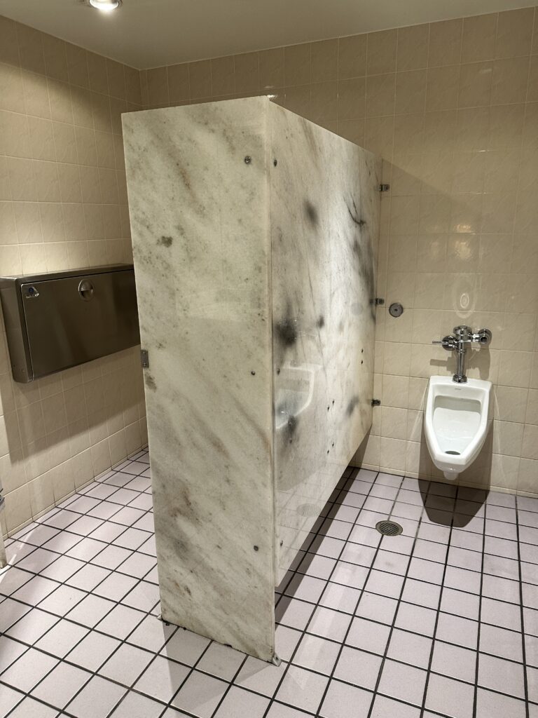 Delta Sky Club Honolulu | Guide & Review (2025) Hawaii Calling a bathroom with a urinal and a marble wall
