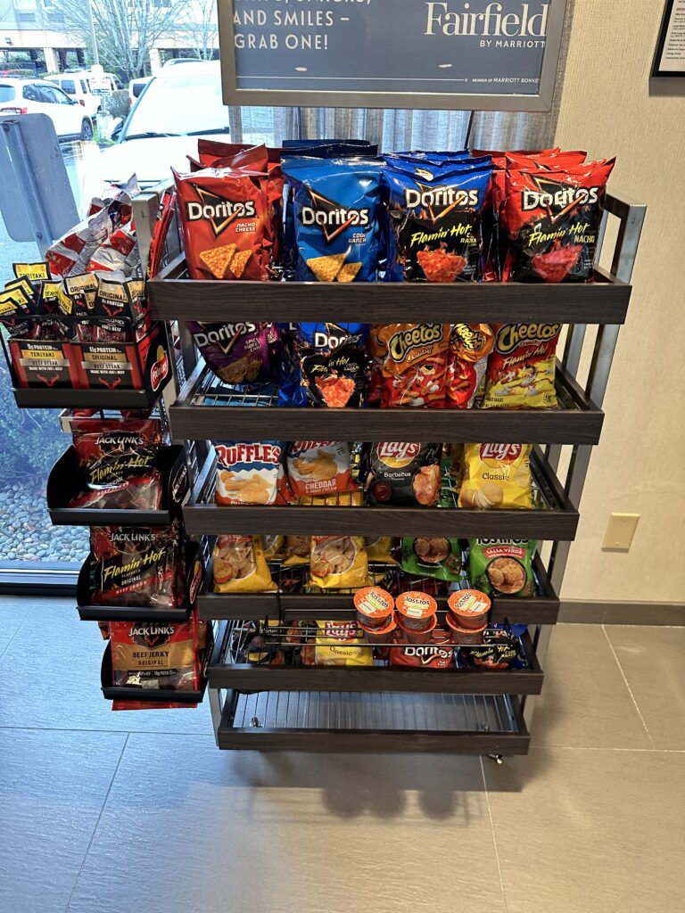 Review: Fairfield Inn & Suites Seattle Sea-Tac Airport Hawaii Calling a shelf with snacks on it