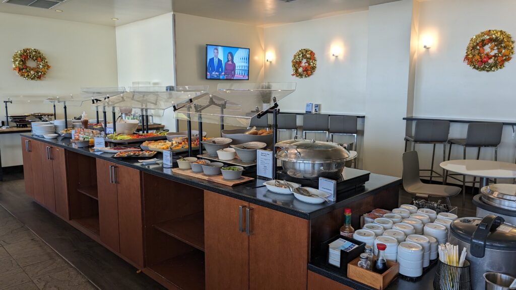 United Airlines Club Honolulu | Unique & Spacious Hawaii Calling a buffet table with food on it