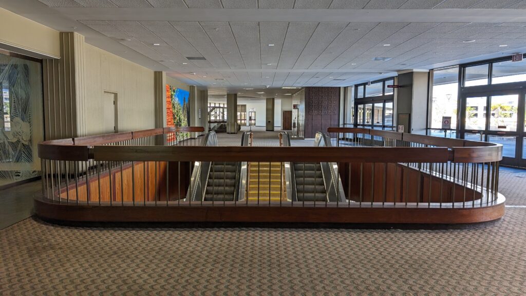 United Airlines Club Honolulu | Unique & Spacious Hawaii Calling a building with escalators and stairs