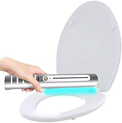 5 Must Have Travel Items To Travel Healthy In 2024 Hawaii Calling a hand holding a light on a toilet seat