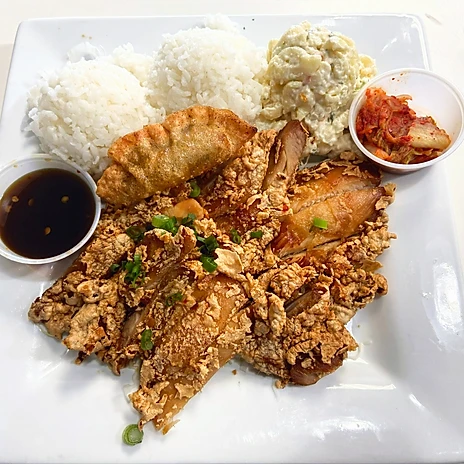 10 Best Maui Restaurants | Dining Guide for (2025) Hawaii Calling a plate of food with sauces and rice