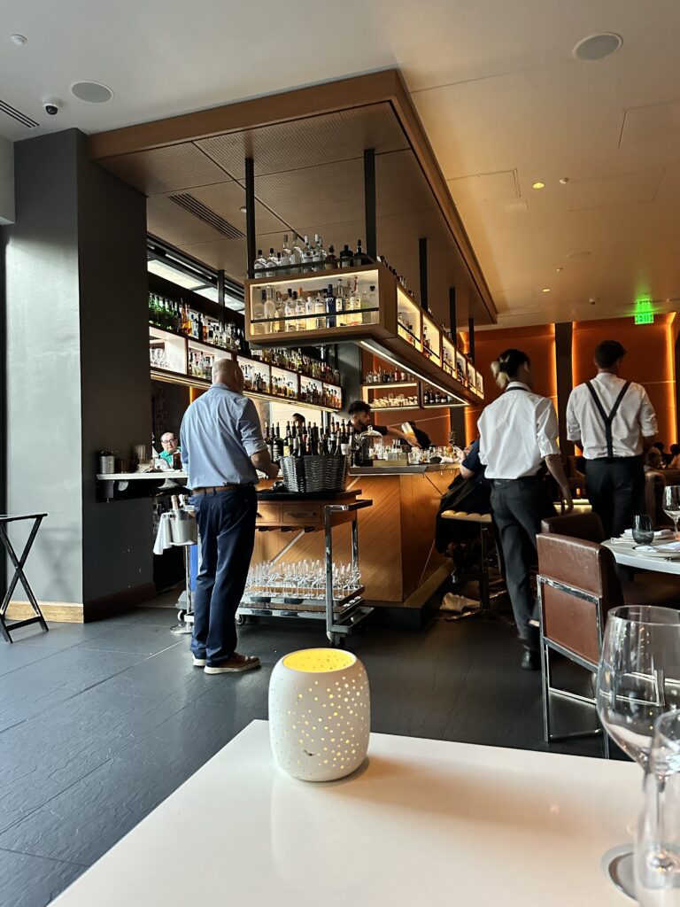 STRIPSTEAK Waikiki Review: A Sizzling Waikiki Steakhouse Experience Hawaii Calling a group of people standing in a restaurant