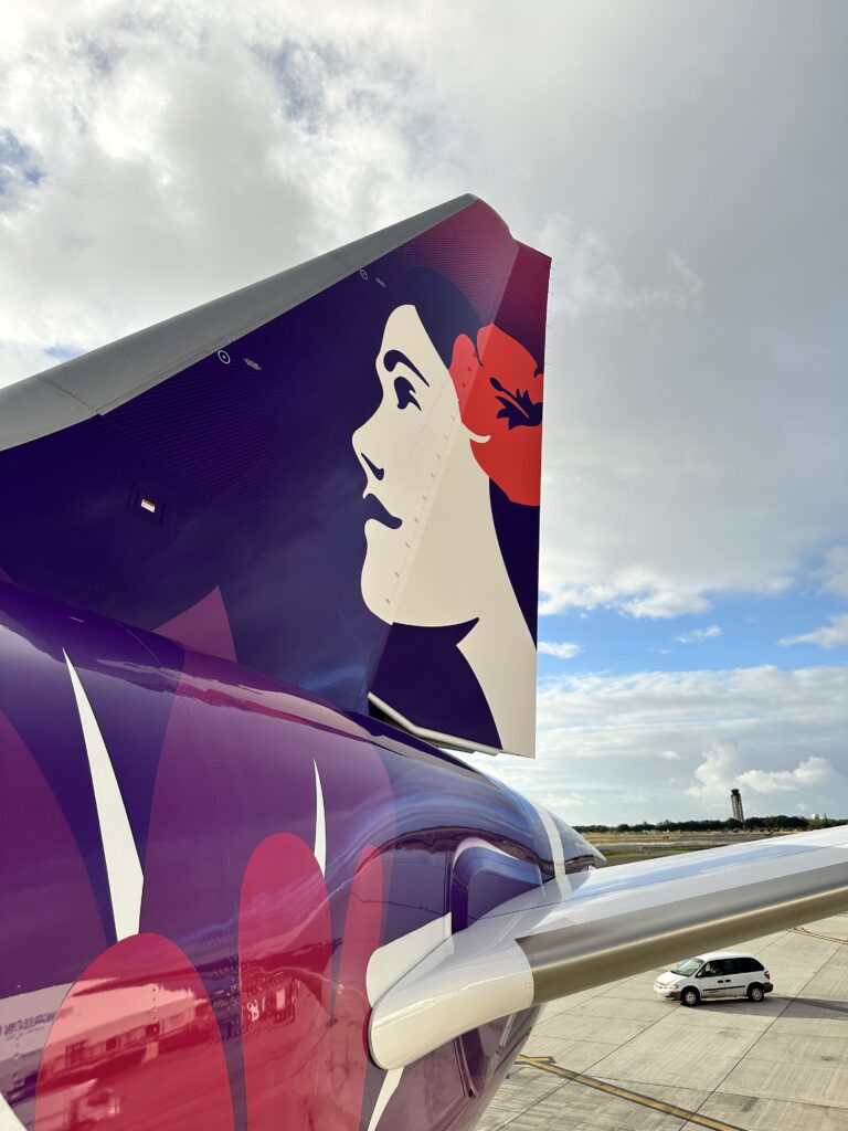 Hawaiian Airlines Boeing 787 Dreamliner Walk Through Hawaii Calling a tail fin of an airplane with a woman's face on it