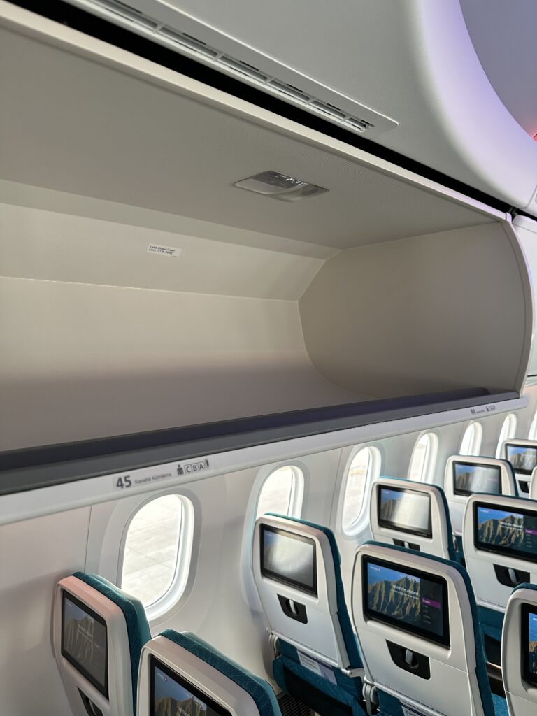 Hawaiian Airlines Boeing 787 Dreamliner Walk Through Hawaii Calling an airplane with seats and a screen