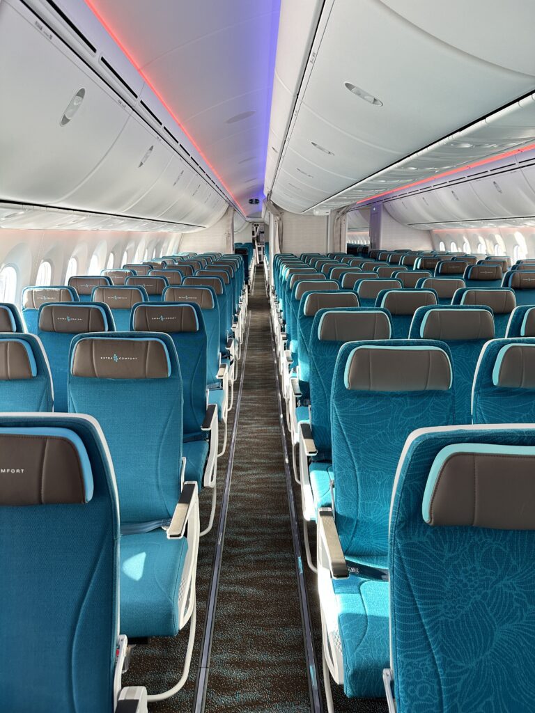 Hawaiian Airlines Boeing 787 Dreamliner Walk Through Hawaii Calling an airplane with blue seats