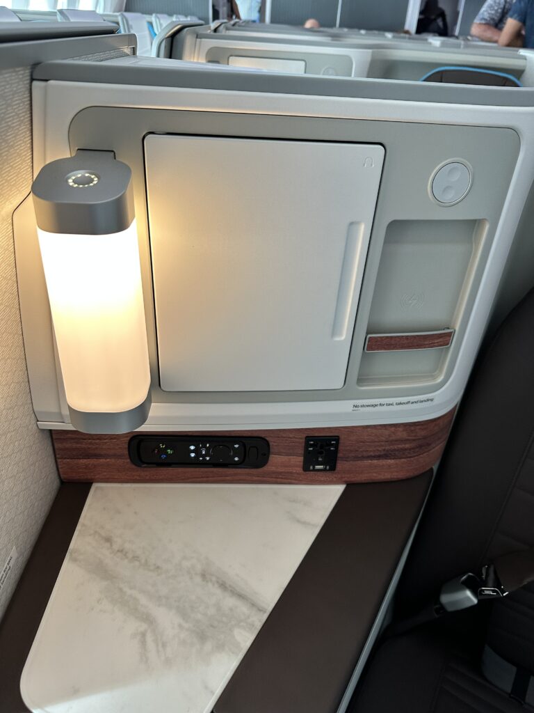 Hawaiian Airlines Boeing 787 Dreamliner Walk Through Hawaii Calling a light on a shelf