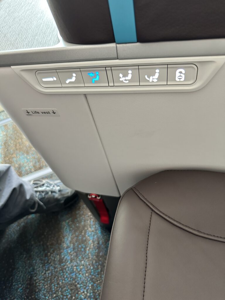 Hawaiian Airlines Boeing 787 Dreamliner Walk Through Hawaii Calling a seat with lights on the side