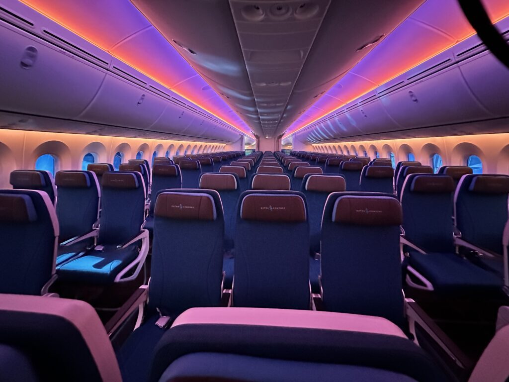 Hawaiian Airlines Boeing 787 Dreamliner Walk Through Hawaii Calling an airplane with rows of seats