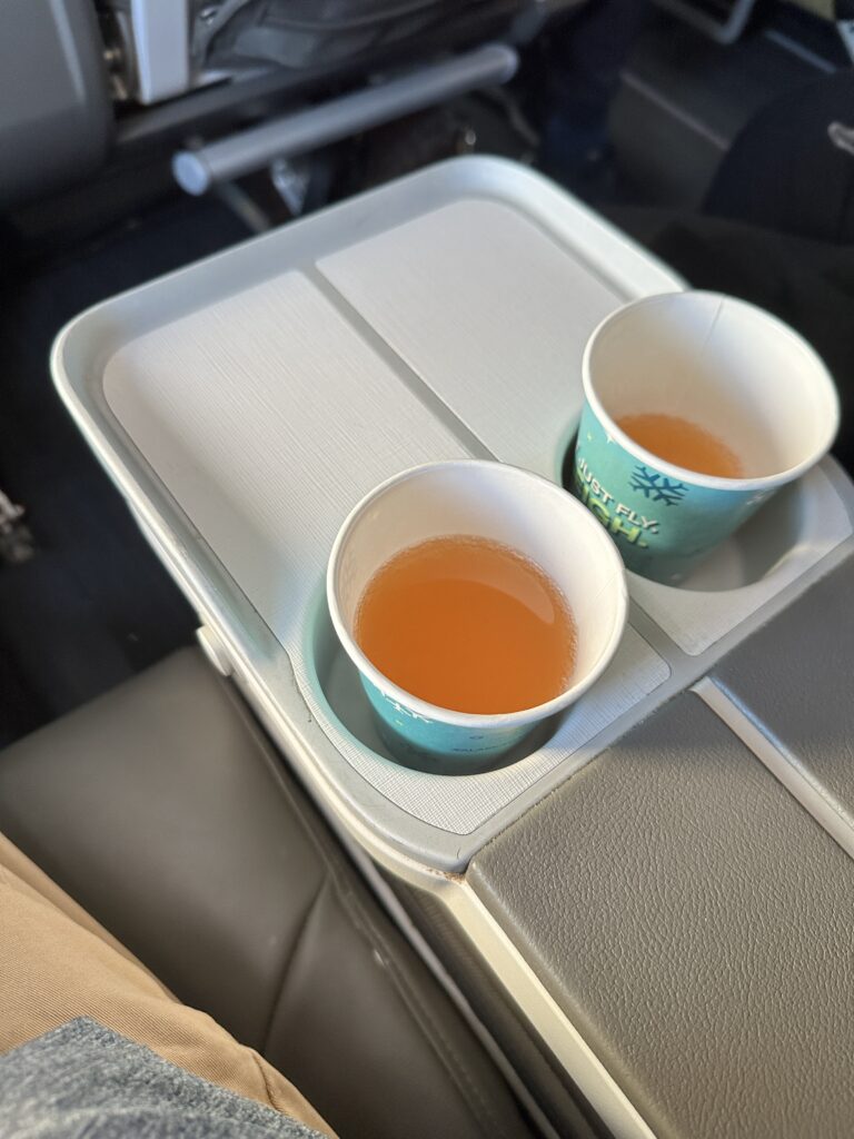 Review: Alaska Airlines Boeing 737 Max 9 First Class SEA-HNL Hawaii Calling two cups of liquid on a tray