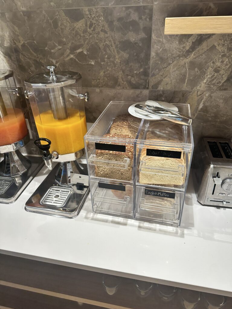 Review: Renaissance Honolulu Hotel & Spa | Oahu's Newest Hotel Hawaii Calling a group of food containers on a counter