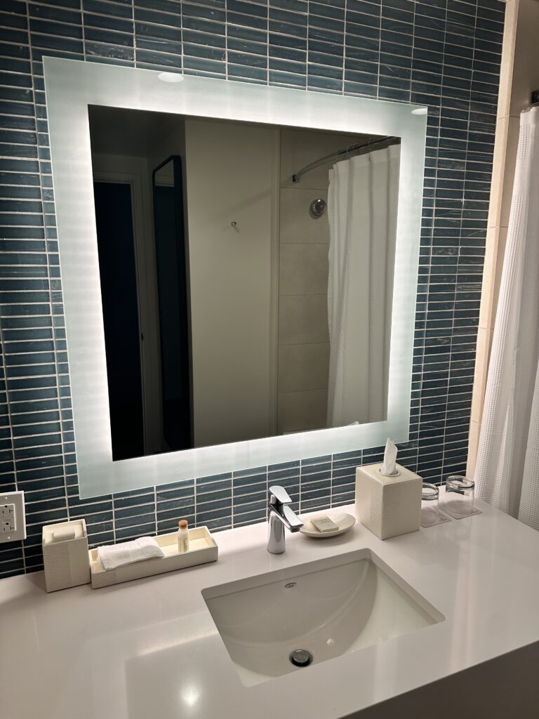 Review: Renaissance Honolulu Hotel & Spa | Oahu's Newest Hotel Hawaii Calling a mirror above a sink