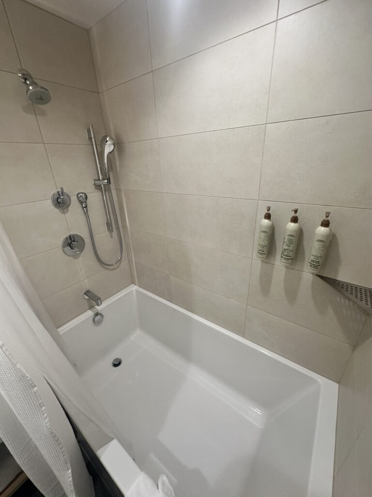 Review: Renaissance Honolulu Hotel & Spa | Oahu's Newest Hotel Hawaii Calling a shower and bathtub in a bathroom