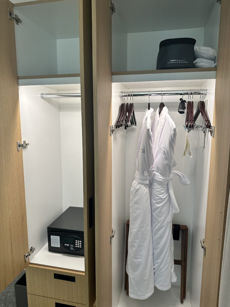 Review: Renaissance Honolulu Hotel & Spa | Oahu's Newest Hotel Hawaii Calling a closet with white robes and a safe
