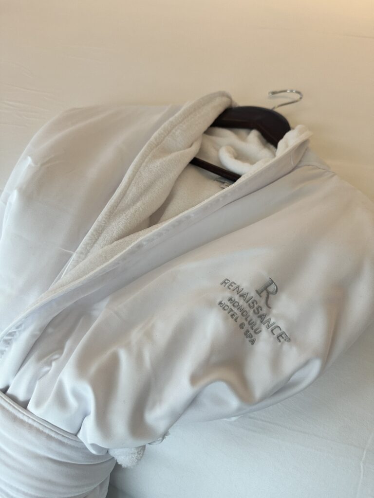Review: Renaissance Honolulu Hotel & Spa | Oahu's Newest Hotel Hawaii Calling a white robe on a swinger
