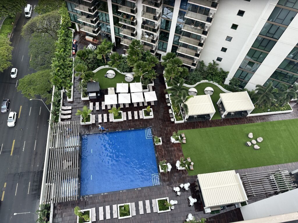 Review: Renaissance Honolulu Hotel & Spa | Oahu's Newest Hotel Hawaii Calling a swimming pool and deck area at the Renaissance Hotel & Spa