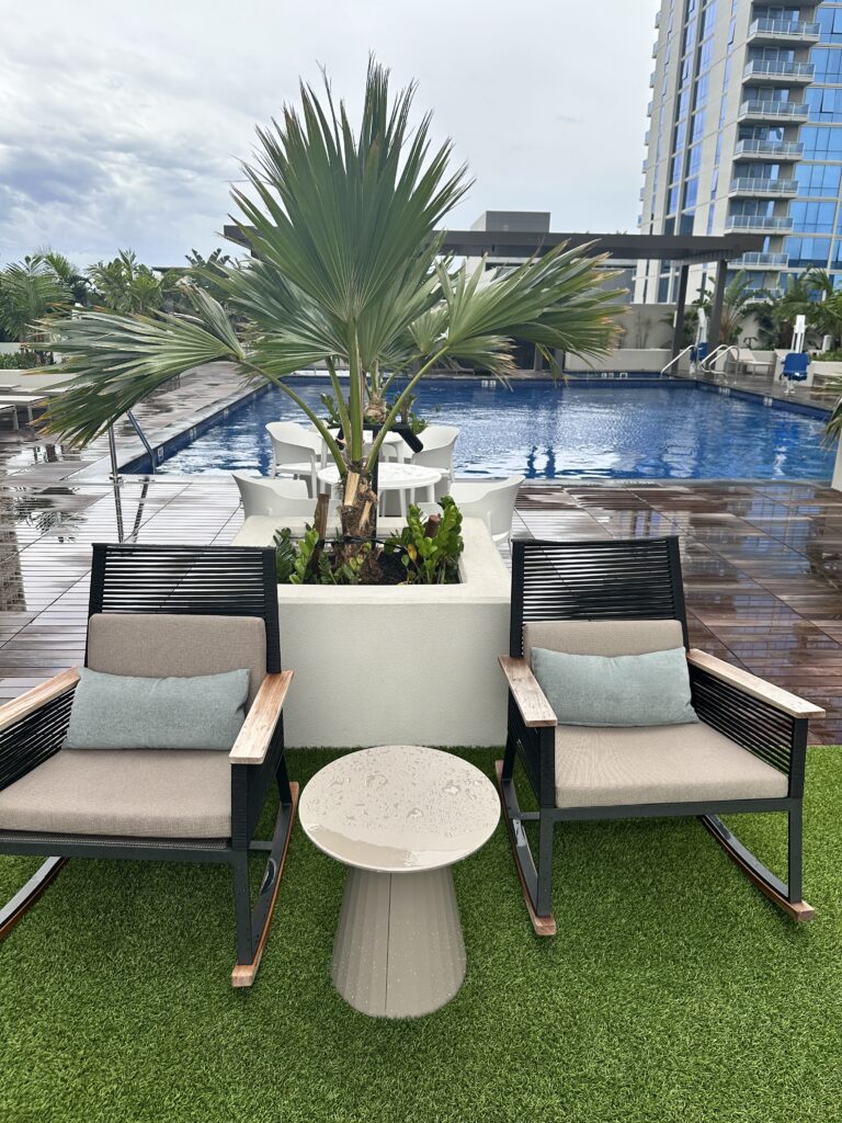 Review: Renaissance Honolulu Hotel & Spa | Oahu's Newest Hotel Hawaii Calling chairs and a table by a pool