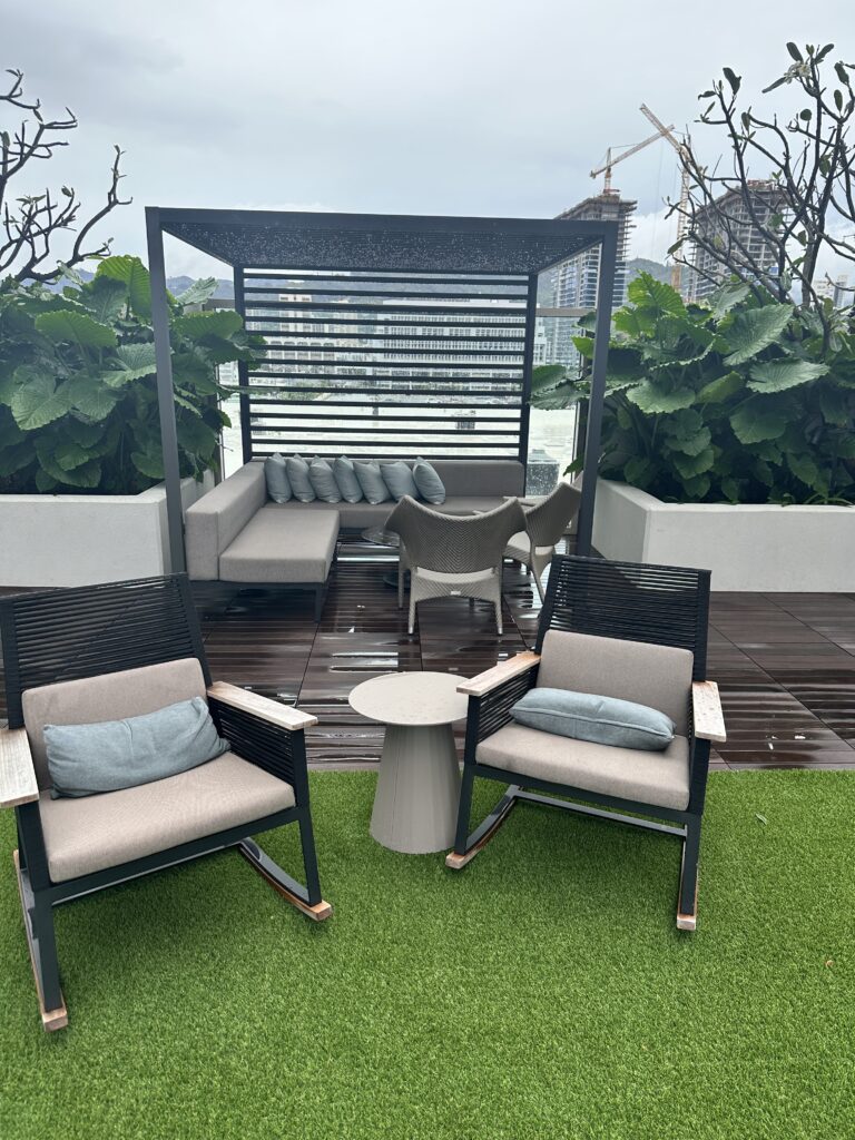 Review: Renaissance Honolulu Hotel & Spa | Oahu's Newest Hotel Hawaii Calling a patio area with chairs and a table