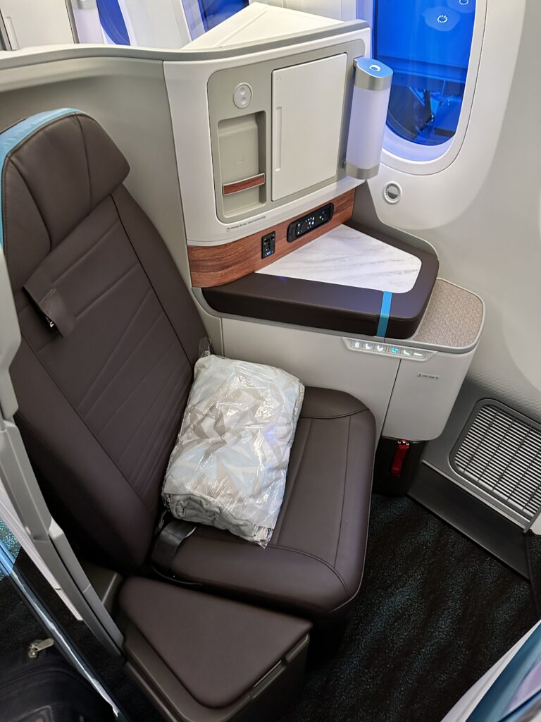 A First Class Experience on Hawaiian Airlines Boeing 787 Dreamliner | Leihōkū Suites | HNL-SFO Hawaii Calling a seat in a plane
