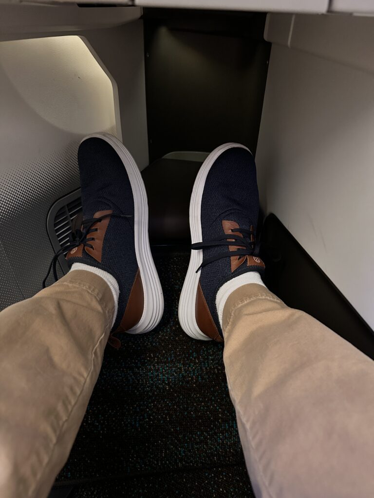 A First Class Experience on Hawaiian Airlines Boeing 787 Dreamliner | Leihōkū Suites | HNL-SFO Hawaii Calling a person's legs in a plane
