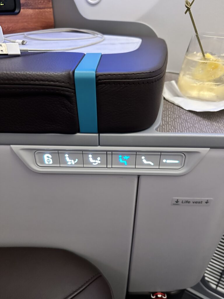 A First Class Experience on Hawaiian Airlines Boeing 787 Dreamliner | Leihōkū Suites | HNL-SFO Hawaii Calling a seat on a table