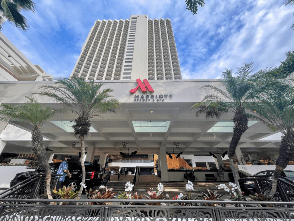 What to Do When Your Hotel is on Strike: Strategies for Travelers (2025) Hawaii Calling a building with palm trees and a sign