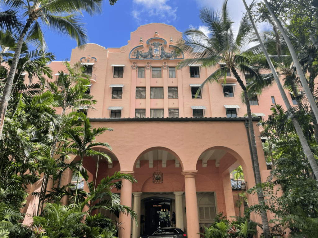What to Do When Your Hotel is on Strike: Strategies for Travelers (2025) Hawaii Calling a building with palm trees and a car parked in front of it
