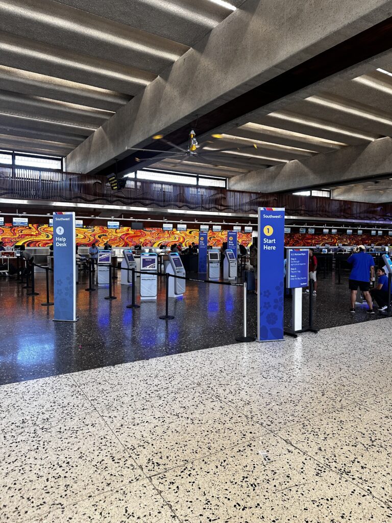 Video Review: Southwest Airlines 737 Max 8 | Honolulu to Lihue Hawaii Calling a group of people in an airport terminal