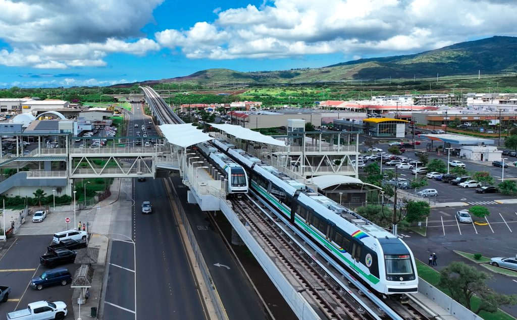 Financing Approved For Ewa Beach Hyatt Hotel Hawaii Calling a train on a bridge over a road
