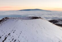 What’s the Best Island to Visit in Hawaii in January (2026)? a snow covered mountain top of Mauna Kea making it one of the best islands to visit in Hawai'i in january