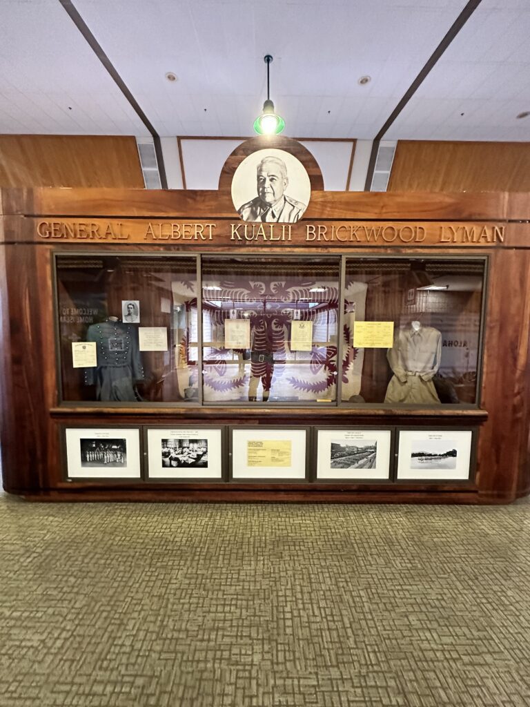Hilo International Airport Guide (2025) | Big Island Hawai'i (ITO) Hawaii Calling a display case with clothes on it
