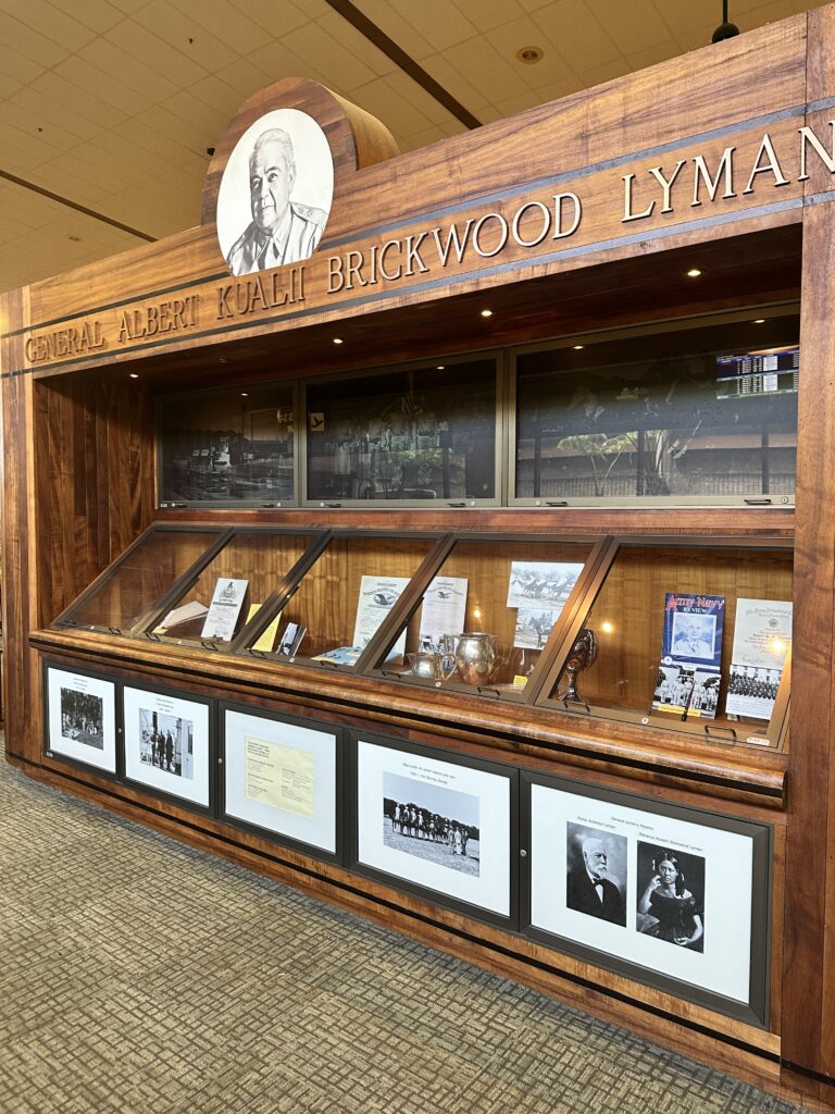 Hilo International Airport Guide (2025) | Big Island Hawai'i (ITO) Hawaii Calling a display case with pictures on it