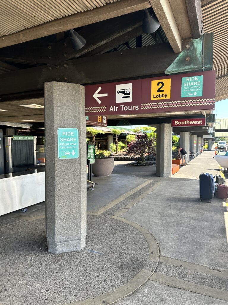 Hilo International Airport Guide (2025) | Big Island Hawai'i (ITO) Hawaii Calling a sign on a pillar