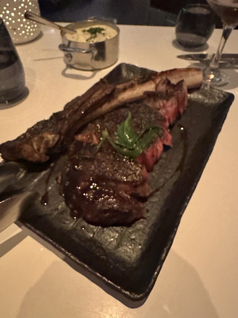 STRIPSTEAK Waikiki Review: A Sizzling Waikiki Steakhouse Experience Hawaii Calling a plate of meat on a table