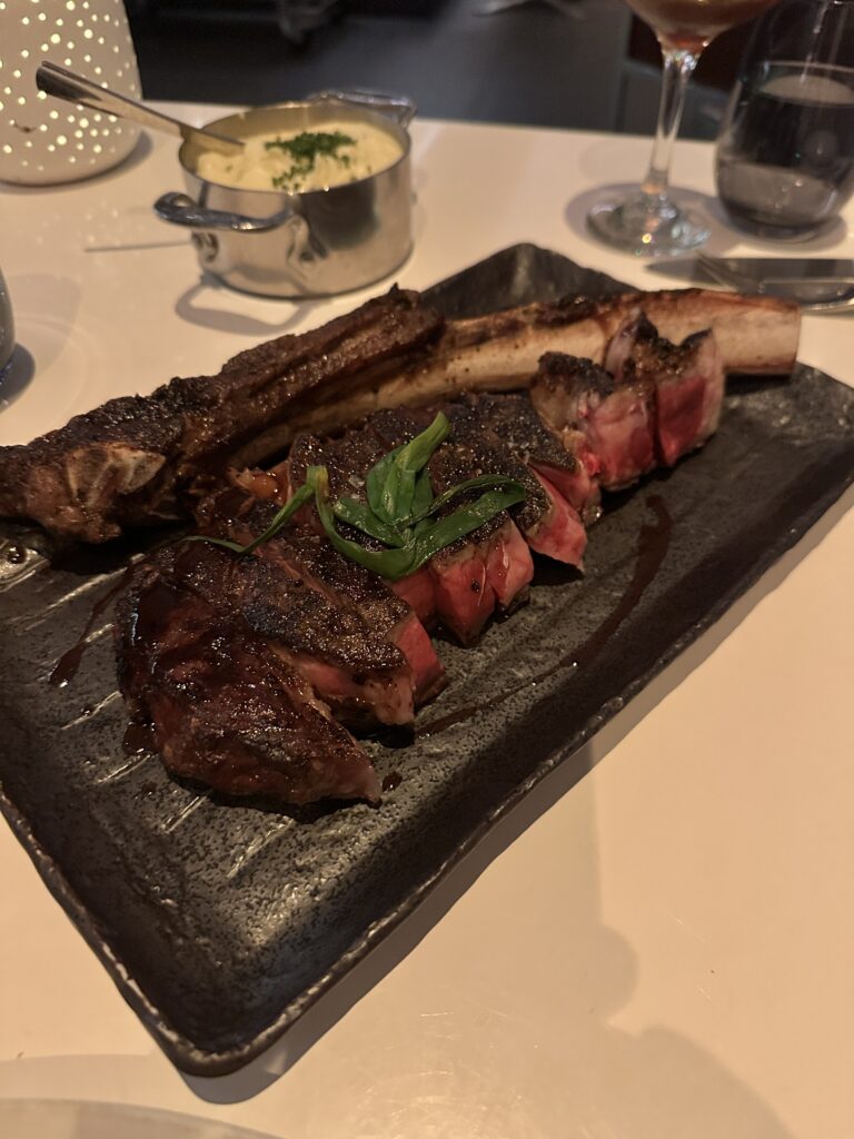 STRIPSTEAK Waikiki Review: A Sizzling Waikiki Steakhouse Experience Hawaii Calling a plate of meat on a table