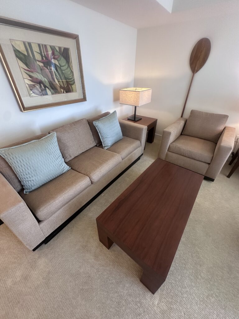 Ka La'i Waikiki Beach, A Hilton LXR Property | Review & Video Hawaii Calling a living room with a couch and a coffee table