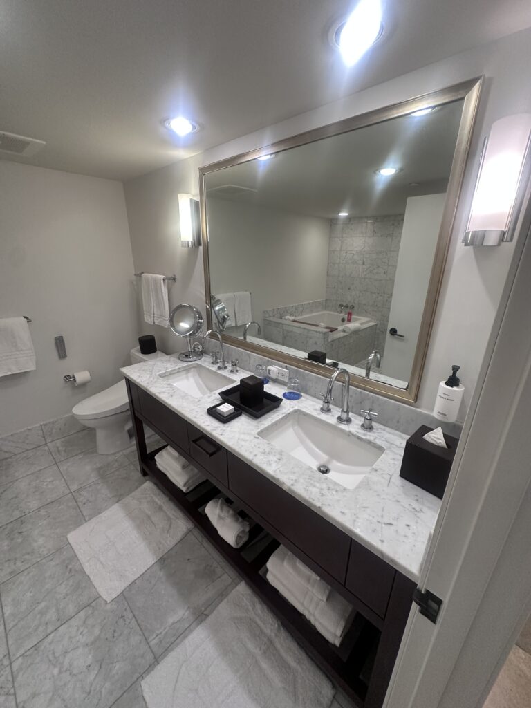 Ka La'i Waikiki Beach, A Hilton LXR Property | Review & Video Hawaii Calling a bathroom with a large mirror